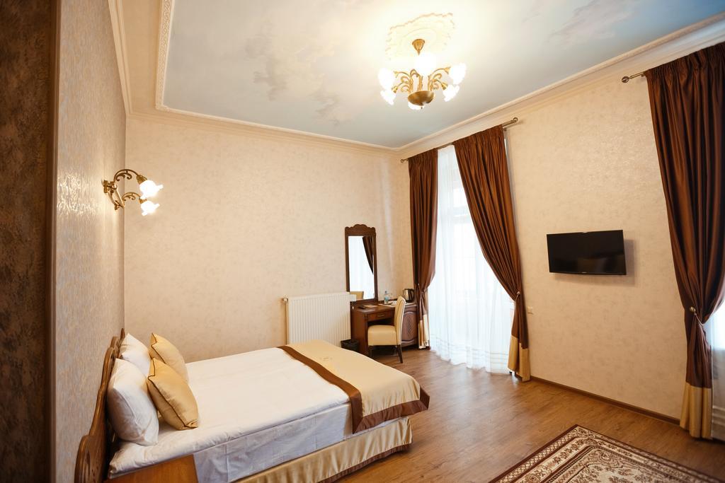 Mini-Hotel Guest House Inn Lviv Quarto foto